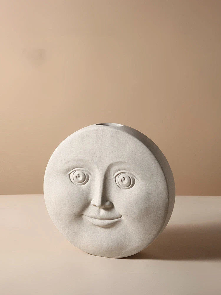 Stylish ceramic face vase with unique human-inspired designs, perfect for adding a touch of Kiwi charm to any living space