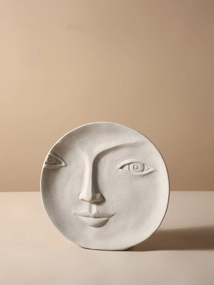 Stylish ceramic face vase with unique human-inspired designs, perfect for adding a touch of Kiwi charm to any living space