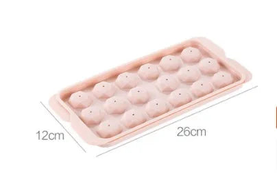 Sky blue and pink round ball ice cube trays showing 18 and 33 grid options