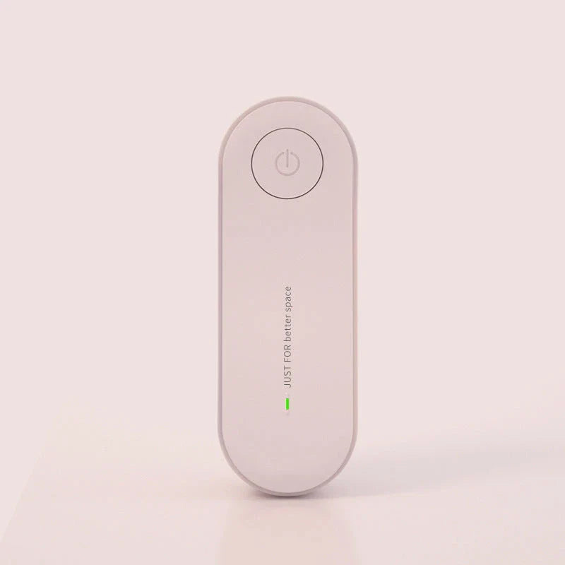 Compact negative ion air purifier in various colors, releasing 5 million ions to purify the air in your home or office