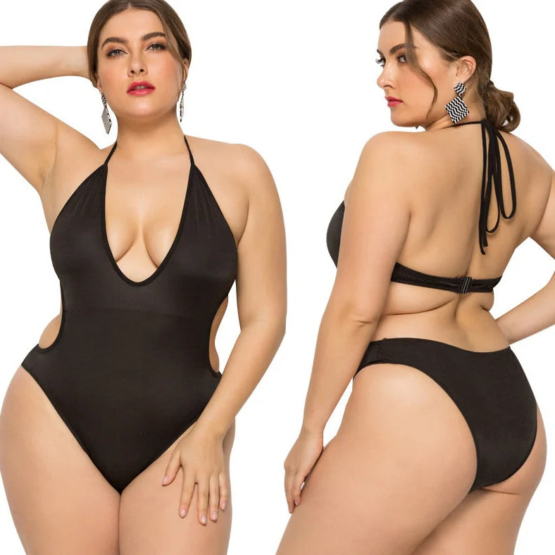 Black women's plus size swimsuit with deep V-neck and attached skirt, sling back design