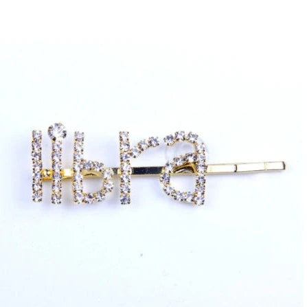 Golden electroplated constellation word clip hairpin showing zodiac design on 3.5cm metal surface
