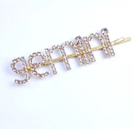 Golden electroplated constellation word clip hairpin showing zodiac design on 3.5cm metal surface