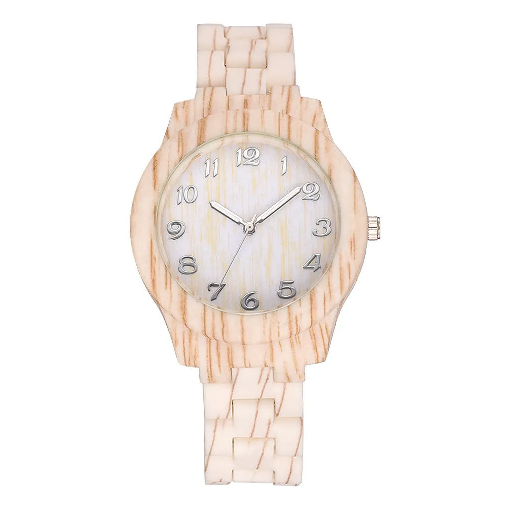Retro style quartz watch with wood grain dial on a beige silicone strap, showing the single folding buckle clasp.
