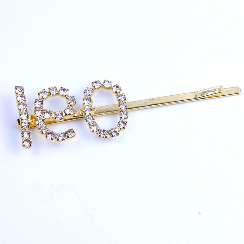 Golden electroplated constellation word clip hairpin showing zodiac design on 3.5cm metal surface