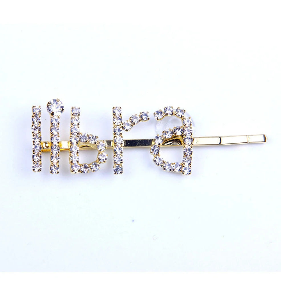 Golden electroplated constellation word clip hairpin showing zodiac design on 3.5cm metal surface