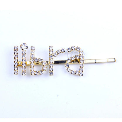 Golden electroplated constellation word clip hairpin showing zodiac design on 3.5cm metal surface