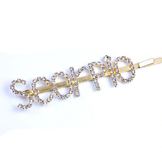 Golden electroplated constellation word clip hairpin showing zodiac design on 3.5cm metal surface