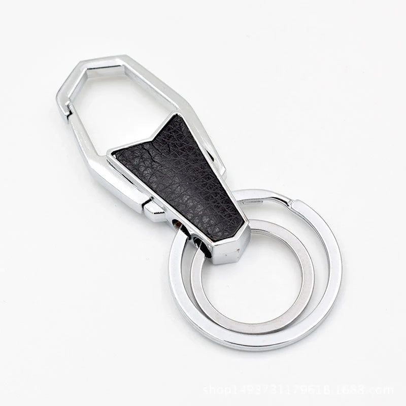 Heart-shaped leather and metal keychain in various colours