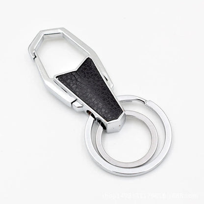 Heart-shaped leather and metal keychain in various colours