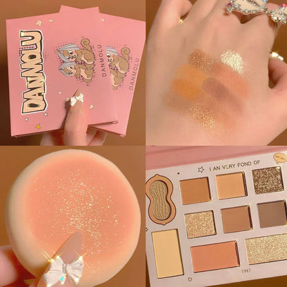 DANMOLU Shaved Mouse Eyeshadow Palette showing 12 colour pans in compact 15cm x 10cm case with dual-ended applicator