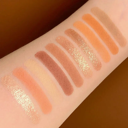 DANMOLU Shaved Mouse Eyeshadow Palette showing 12 colour pans in compact 15cm x 10cm case with dual-ended applicator