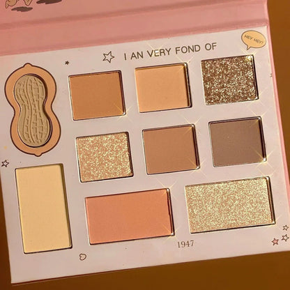 DANMOLU Shaved Mouse Eyeshadow Palette showing 12 colour pans in compact 15cm x 10cm case with dual-ended applicator