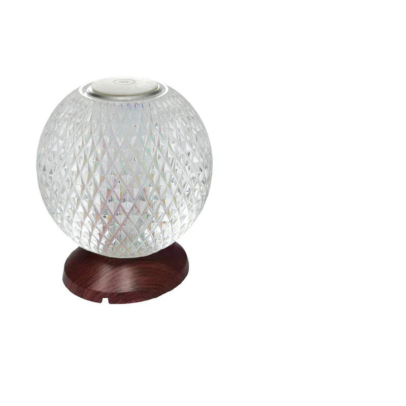 Acrylic crystal lamp with adjustable touch controls, emitting a warm, soothing glow for a relaxing ambiance