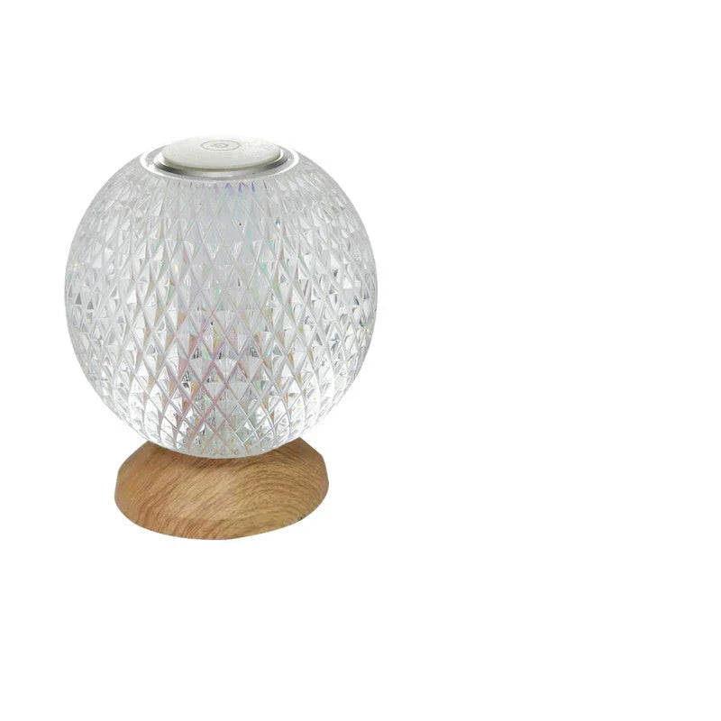 Acrylic crystal lamp with adjustable touch controls, emitting a warm, soothing glow for a relaxing ambiance