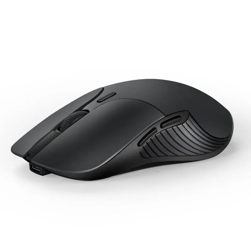 Blue Smart Voice Mouse with translation function on a desk next to a laptop.