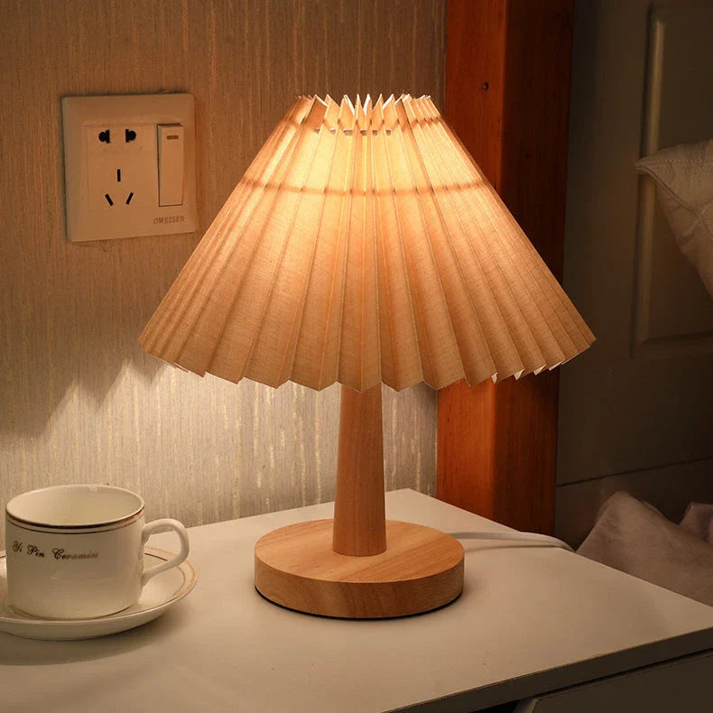 Versatile bedside lamp with dimmable LED light, bamboo base, and pleated fabric shade for New Zealand homes