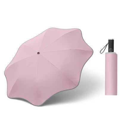 Curved automatic umbrella with luminous transparent canopy showing 8 alloy ribs and rubber handle