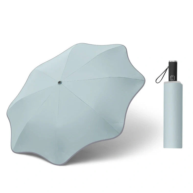 Curved automatic umbrella with luminous transparent canopy showing 8 alloy ribs and rubber handle