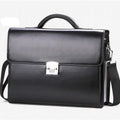 Men's black horizontal PU leather business briefcase with zipper open showing internal pockets.