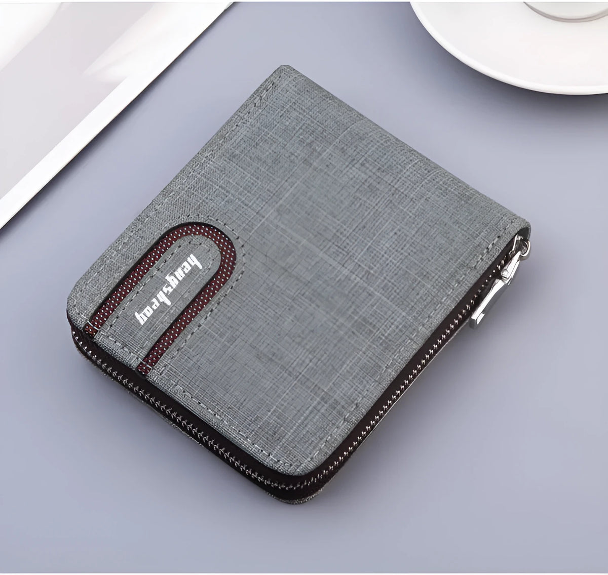 Canvas men's short zipper wallet with retro car suture pattern in black, brown, and light grey colours on a plain surface.