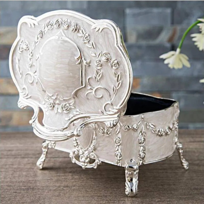 Ancient tin and silver white zinc alloy jewellery storage boxes in large, medium, and small sizes.