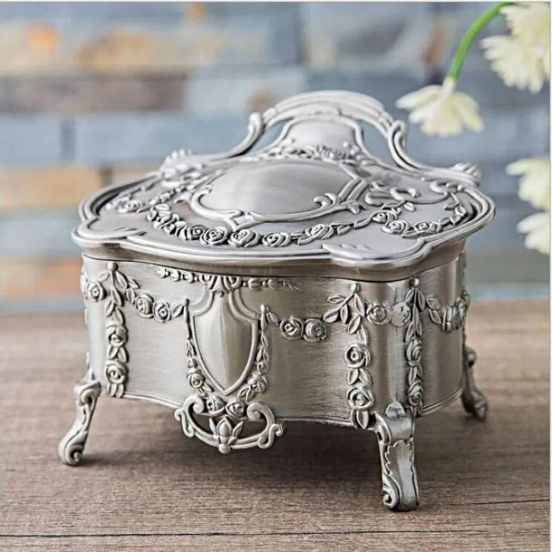 Ancient tin and silver white zinc alloy jewellery storage boxes in large, medium, and small sizes.