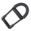 Black hand gripper wrist strength device with spring steel coil on neutral background