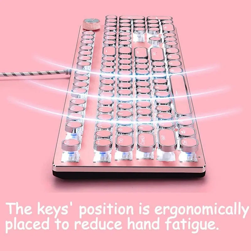 Silver and pink wired mechanical keyboard with green switches and matching ergonomic mouse.