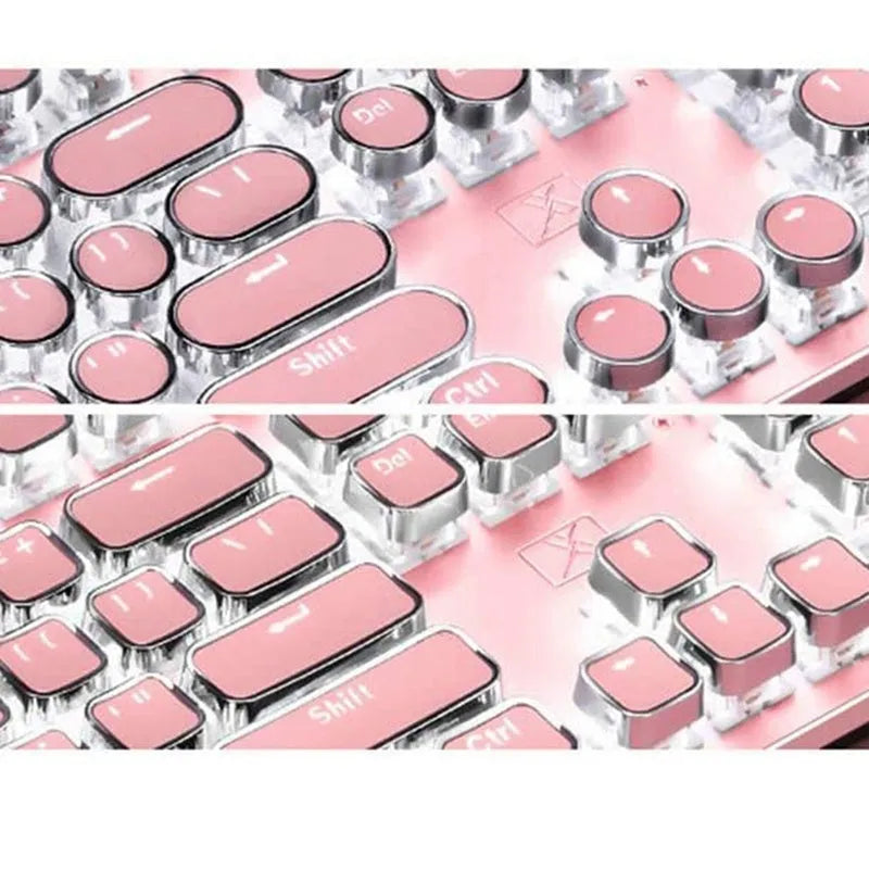 Silver and pink wired mechanical keyboard with green switches and matching ergonomic mouse.