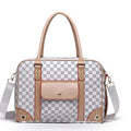 Small blue nylon soft sided pet carrier with mesh panels and carry handle, airline approved size