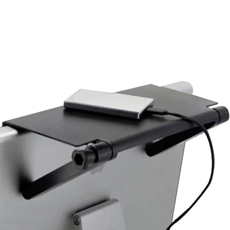 Plastic TV set-top box and router storage rack with hook-free installation on a desktop.