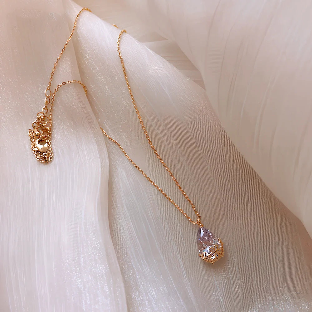 Women's adjustable crystal water drop pendant necklace with 21-50cm chain and silver gold plating options