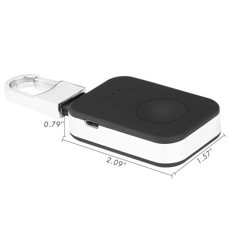 Black portable wireless power bank keychain for charging Apple Watch on a keyring.