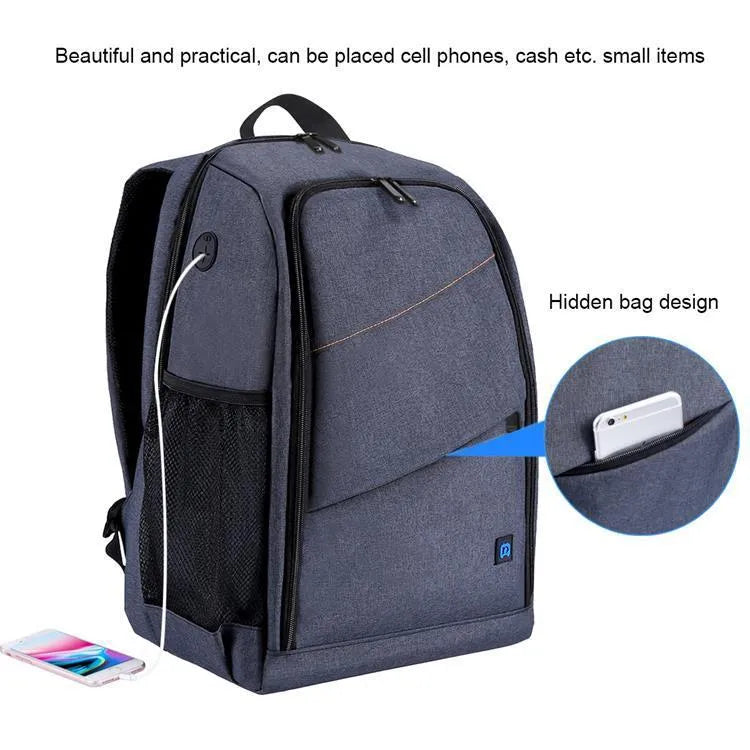 Black cotton outdoor photography mountaineering bag 20L with straps on a rocky hiking trail