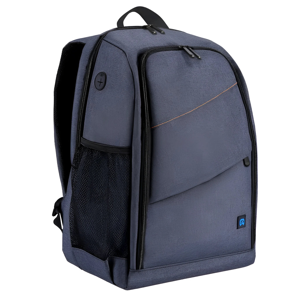 Black cotton outdoor photography mountaineering bag 20L with straps on a rocky hiking trail