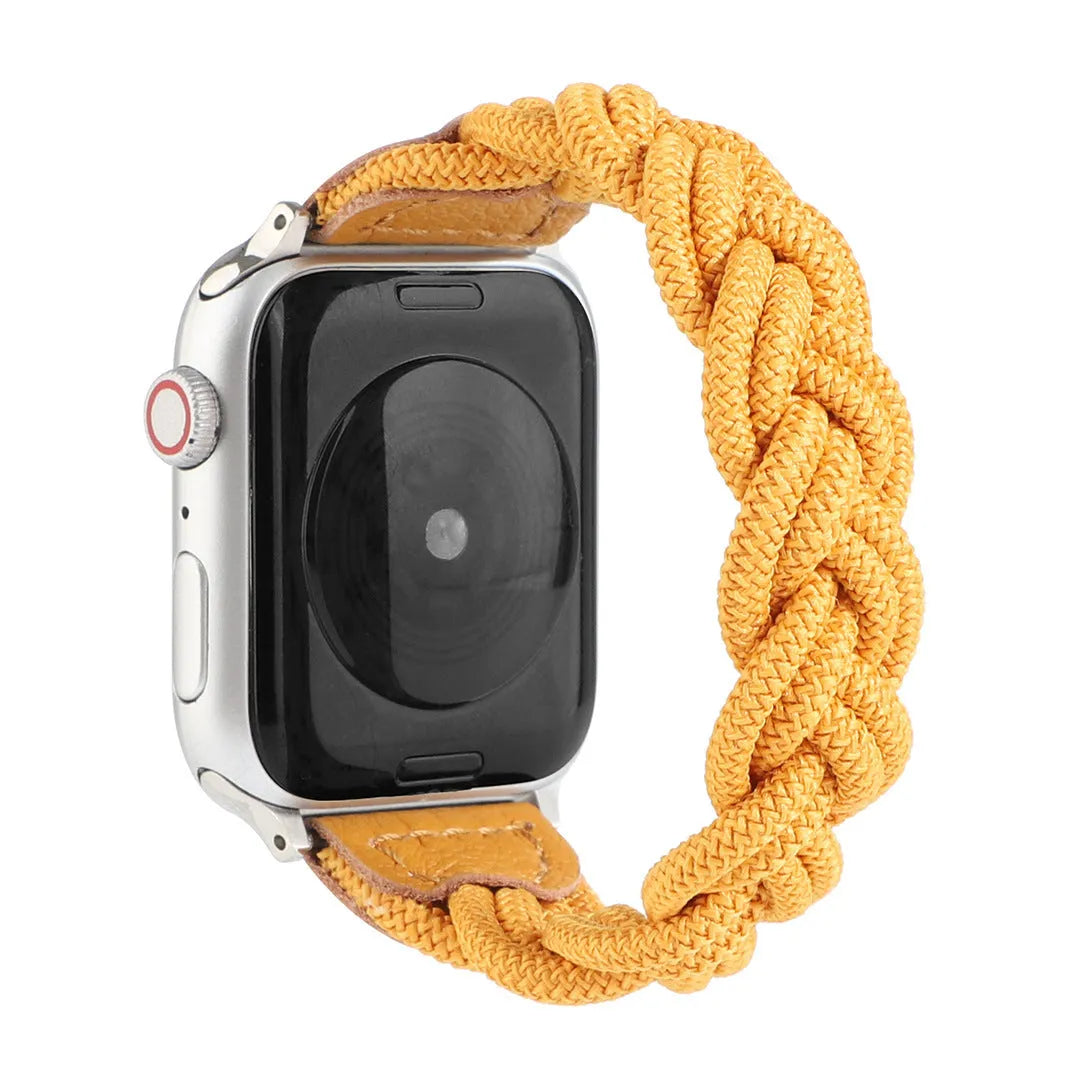 Braided single loop textile strap for Apple Watch on a wrist, shown in an army green colour.
