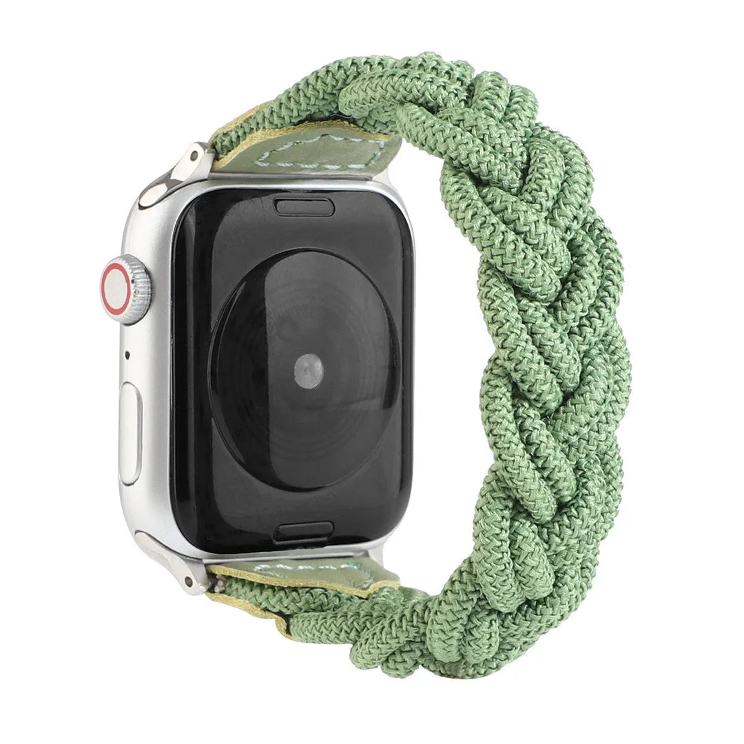 Braided single loop textile strap for Apple Watch on a wrist, shown in an army green colour.