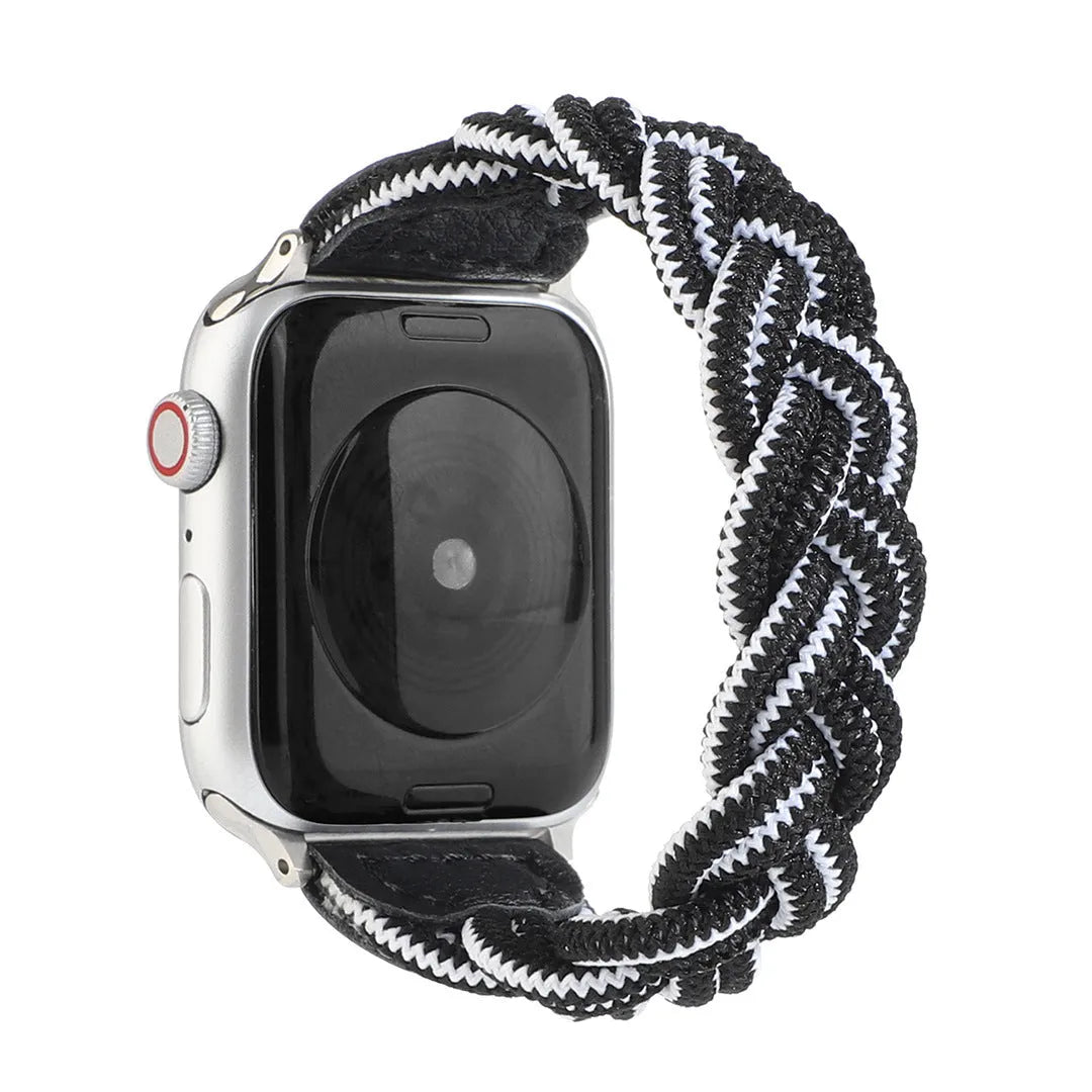 Braided single loop textile strap for Apple Watch on a wrist, shown in an army green colour.