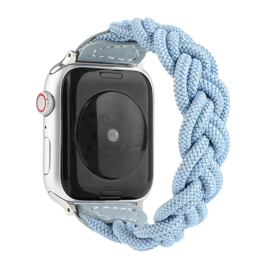 Braided single loop textile strap for Apple Watch on a wrist, shown in an army green colour.