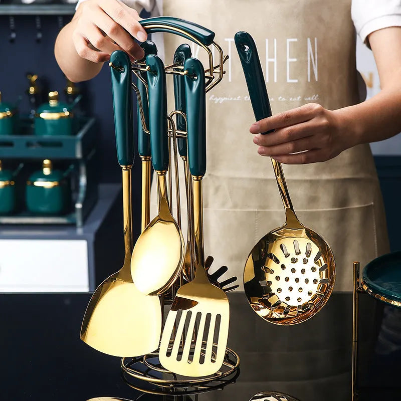 7-piece stainless steel kitchen utensil set with slotted spatula, turner, ladle, serving spoon, and pasta server