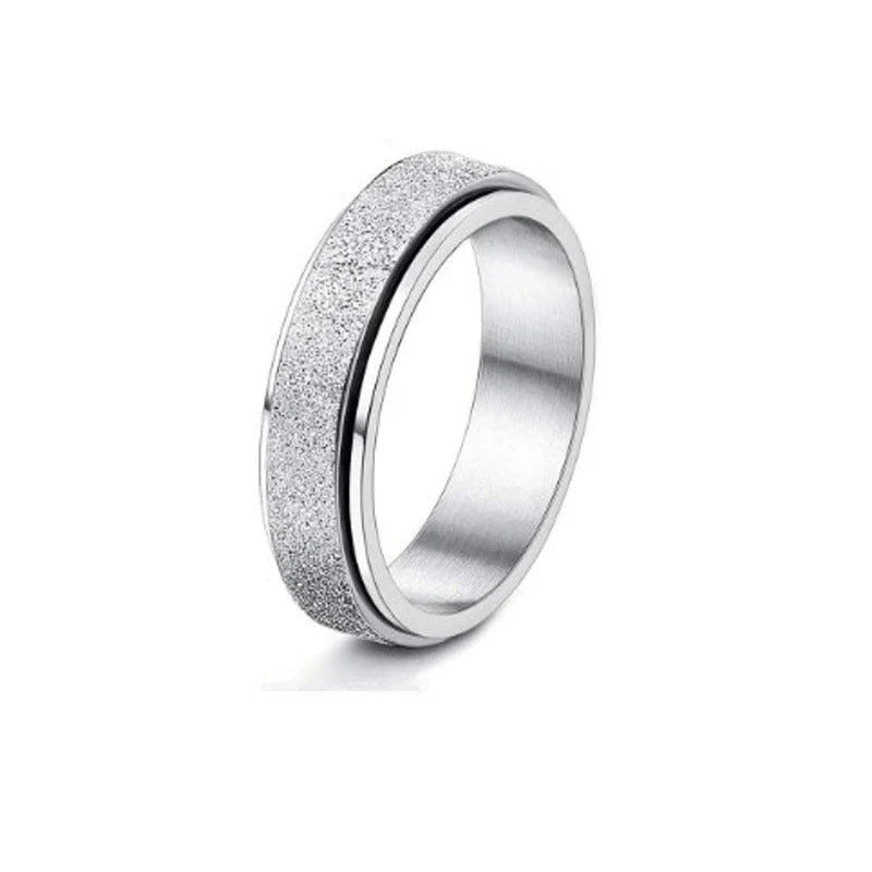Stainless steel rotatable spinner ring with moon and stars design for stress relief
