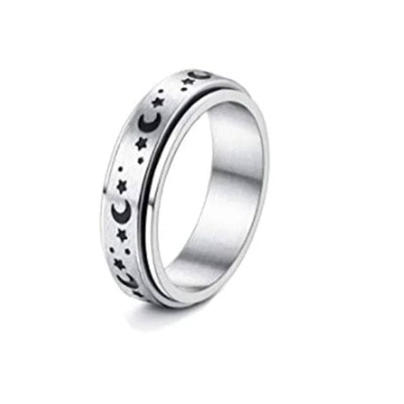 Stainless steel rotatable spinner ring with moon and stars design for stress relief