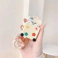 Silicone flip protective case for Apple AirPods in pink, purple, white, green, orange, and yellow colour options