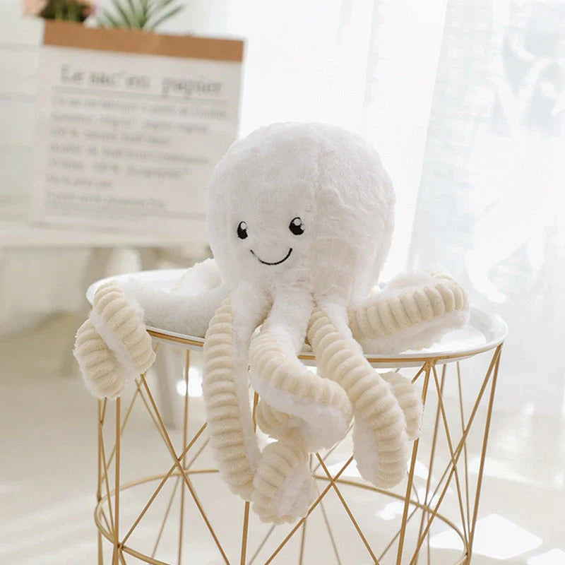 Adorable plush octopus pendant with elastic tentacles, available in various colors and sizes