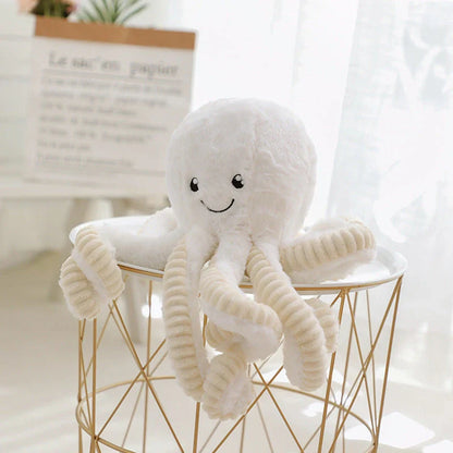 Adorable plush octopus pendant with elastic tentacles, available in various colors and sizes