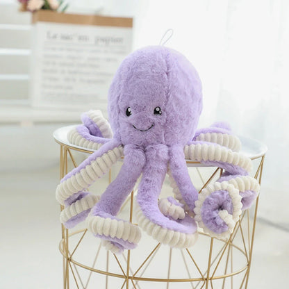 Adorable plush octopus pendant with elastic tentacles, available in various colors and sizes