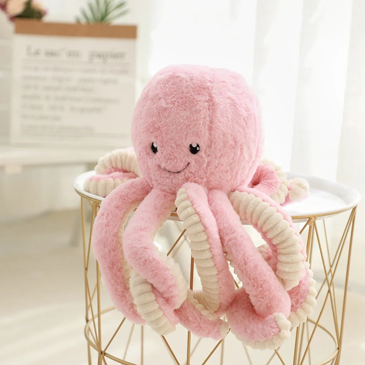 Adorable plush octopus pendant with elastic tentacles, available in various colors and sizes