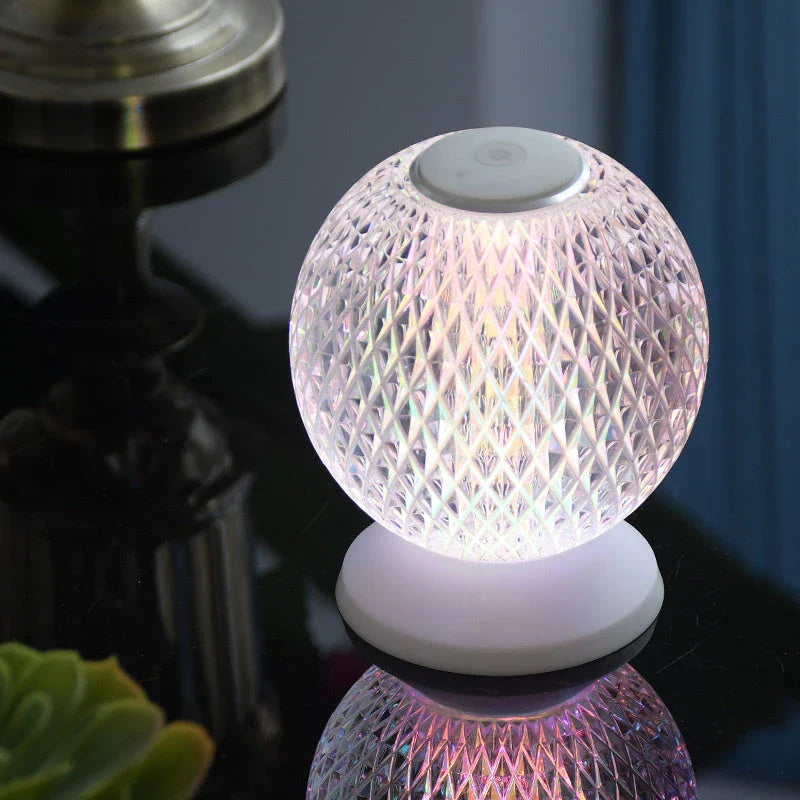 Acrylic crystal lamp with adjustable touch controls, emitting a warm, soothing glow for a relaxing ambiance