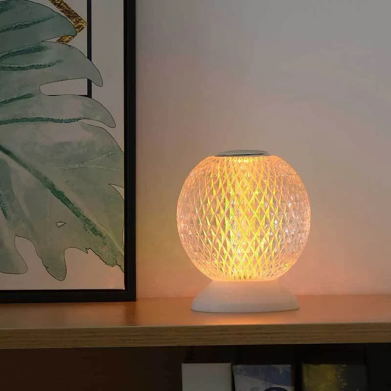 Acrylic crystal lamp with adjustable touch controls, emitting a warm, soothing glow for a relaxing ambiance